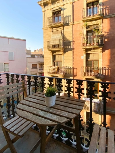 Sun-kissed balcony, urban oasis