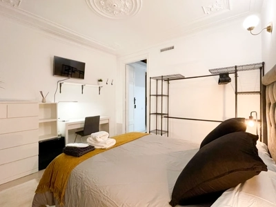 Serene bedroom bathed in morning light