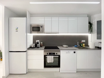 Sleek kitchen with stainless steel appliances